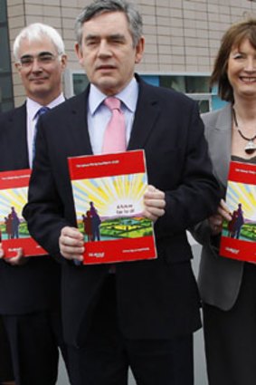 Gordon Brown and his cabinet hold copies of the Labour Manifesto in Birmingham.