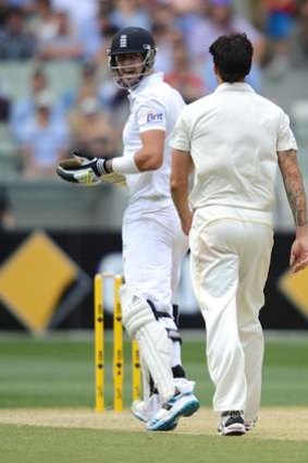 Mitchell Johnson becomes frustrated with Kevin Pietersen.