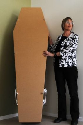 ACT Greens MLA Caroline Le Couteur, pictured with a cardboard coffin in 2011.