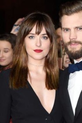 Dakota Johnson and Jamie Dornan at the <i>Fifty Shades of Grey</i> premiere in Berlin.