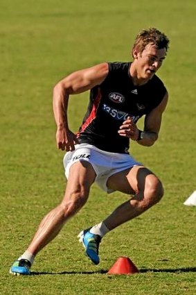 Brent Prismall trains for Essendon during the 2012 season.