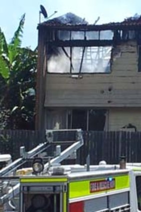 Gutted: The top floor of the Claymore townhouse ''was just flames'' when fire crews arrived on Tuesday.