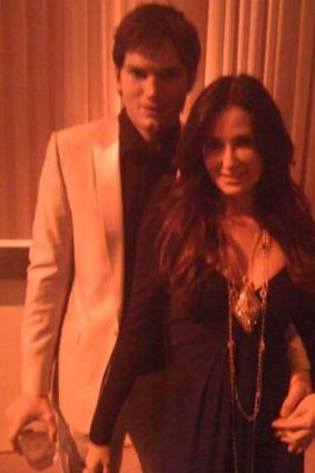Ashton Kutcher and Demi Moore pose for a Twitter photo during their Oscars after-party.