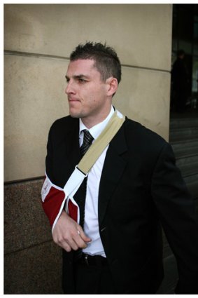 Carlton footballer Heath Scotland leaves Melbourne Magistrates Court in September 2006.
