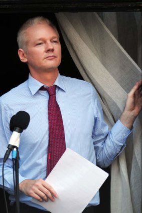 Julian Assange makes a statement on the balcony of the Ecuadorian embassy in London last year.