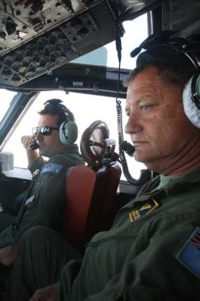 Flight Lieutenant Adam Francki and Warrant Officer Brenton Bell in the cockpit.