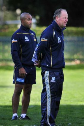 Brumbies consultant coach George Gregan and coach Jake White at training.
