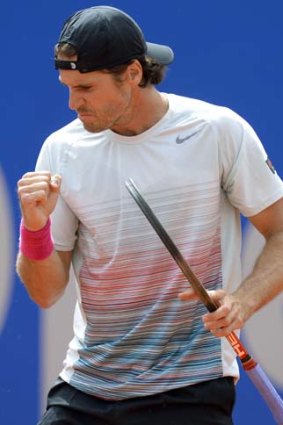 Germany's Tommy Haas reacts after winning a point in his semi-final against Croatia's Ivan Dodig.