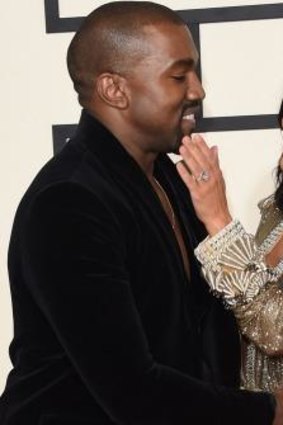 Kanye West with wife Kim Kardashian  at this year's Grammy Awards.