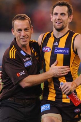 Hawthorn coach Alastair Clarkson shows his appreciation of Luke Hodge after the Hawks' big win over Sydney.