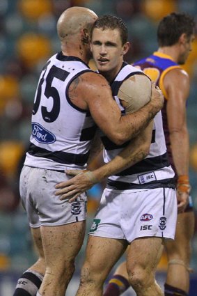 Geelong's Joel Selwood (right) and Paul Chapman celebrate a goal against the Brisbane Lions. But Selwood has a nervous wait ahead of the match review panel's scrutiny of the game.