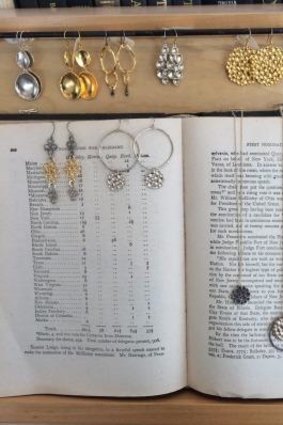 New uses: Jewellery displayed in a shop using an old book.