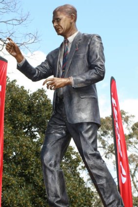 Larger than life: The statue of Norm Smith unveiled at the MCG.