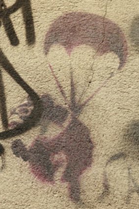 Banksy's parachuting rat, which has been mistakenly painted over in a Melbourne laneway by anti-graffiti workers.