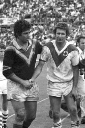 Defeated man ... Eastern Suburbs' Arthur Beetson shakes hands with Graeme Langlands after Easts' 38-0 victory.