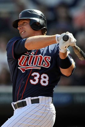 Luke Hughes hits out during his days with the Minnesota Twins.