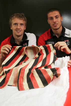 Historic: St Kilda players Tom Lee (left) and Nathan Wright with the jumper from 1888.