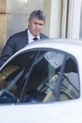 David Gyngell leaves Packer's home on Monday morning.