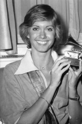 Olivia Newton-John with one of her Grammys for <i>I Honestly Love You</i> in 1975.