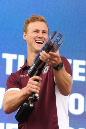Manly Sea Eagles captain Daly Cherry Evans fires prizes into the crowd during the Auckland Nines Civic Reception.