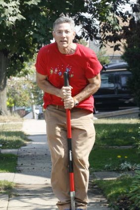 Ashrita Furman chops 40 potatoes in a minute with the blade of his shovel, hopping from one to the next.