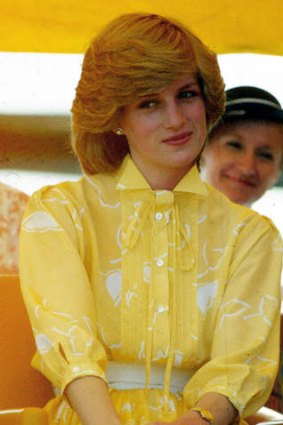 Icon in the making: Princess Diana in an arresting canary outfit at Alice Springs during a royal tour of Australia in 1983.