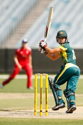 More runs: Nicole Bolton on her way to a century at the MCG.