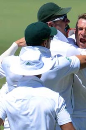 Dale Steyn celebrates a wicket with his South Africa teammates.