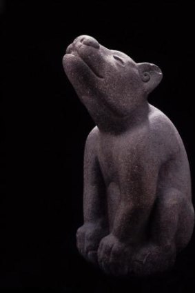 Woof: Sculpture of a dog.    