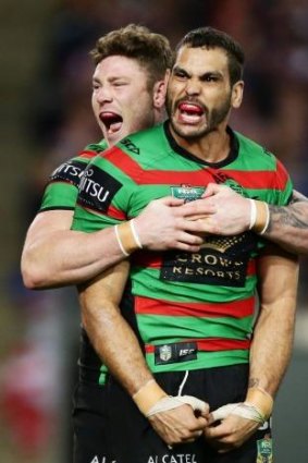 Once more with feeling: Chris McQueen shows Greg Inglis the love.