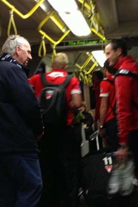Sydney players take to Melbourne's trams to get to the MCG.
