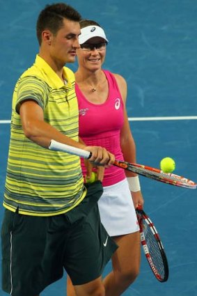 Bernard Tomic with Sam Stosur during the Hopman Cup in December.