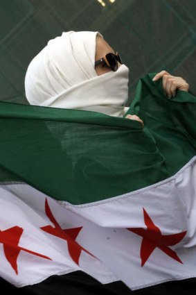 A woman protests in Beirut against Hezbollah's role in Syria. Photo: AFP