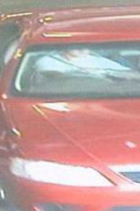 The police image of the man in the stolen car, taken from security camera footage.