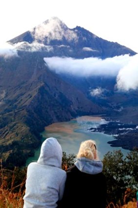 Peak practice ... trekkers enjoy the view of Mount Rinjani.