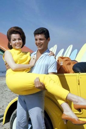 Beach Party: Singer Frankie Avalon, right, and actress Annette Funicello filming on Malibu Beach.
