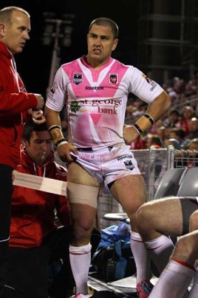 Jamie Soward has his leg strapped after leaving the field with an injury against Manly.
