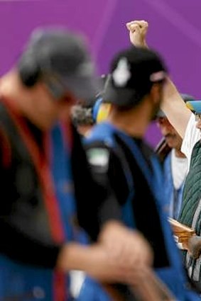 Australia's Michael Diamond celebrates after equalling the world record in his men's trap shooting qualification round at the London 2012 Olympic Games.