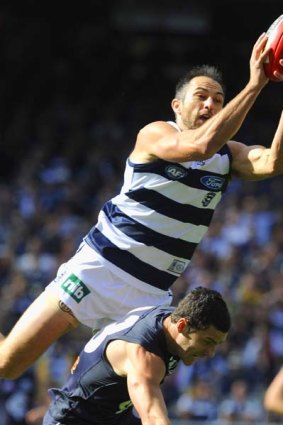 Geelong's James Podsiadly shows off his marking prowess.
