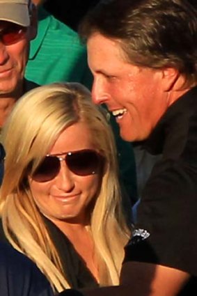 Phil Mickelson celebrates with his wife Amy.