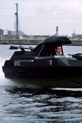 Pierce Brosnan as Bond in <em>The World Is Not Enough</em>.