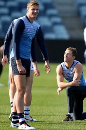Top Cats: Nathan Vardy (left) and Joel Selwood at Simonds Stadium on Tuesday.
