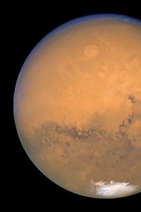 Mars with its trademark red hue.