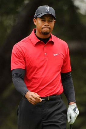 Tiger Woods reacts to his sixth hole tee shot during the final round at the 2010 Chevron World Challenge.