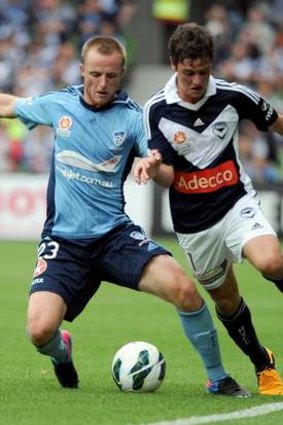 On the ball: Melbourne Victory's Marcos Rojas (right) has been an outstanding performer.