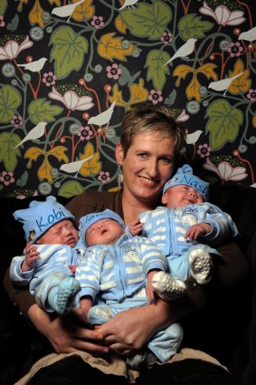 Karen Guthrie with her identical boy triplets (L to R) Kobi, Liam and Nash at a Bite to Eat cafe in the Chifley Shops.