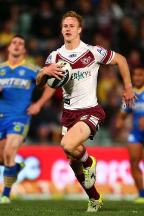 Clean heels: Daly Cherry-Evans breaks the Eels' line during Manly's romp at Parramatta Stadium on Saturday. The Sea Eagles cemented third spot on the ladder while the home side fell further adrift of the 15 teams higher on the ladder.