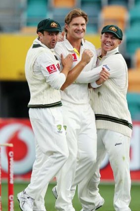 Shane Watson celebrates with Ed Cowan (left) and David Warner during the series against Sri Lanka.