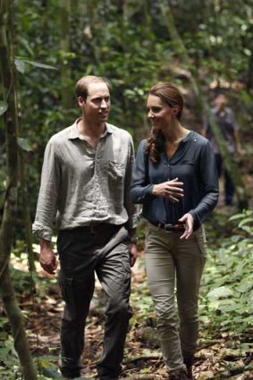 On tour, William and Kate take a walk through a rainforest in Malaysia yesterday.