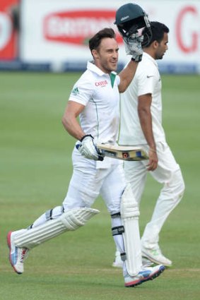 Faf du Plessis of South Africa celebrates his century.